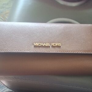 Michael Kors Tan Clutch with Gold Logo